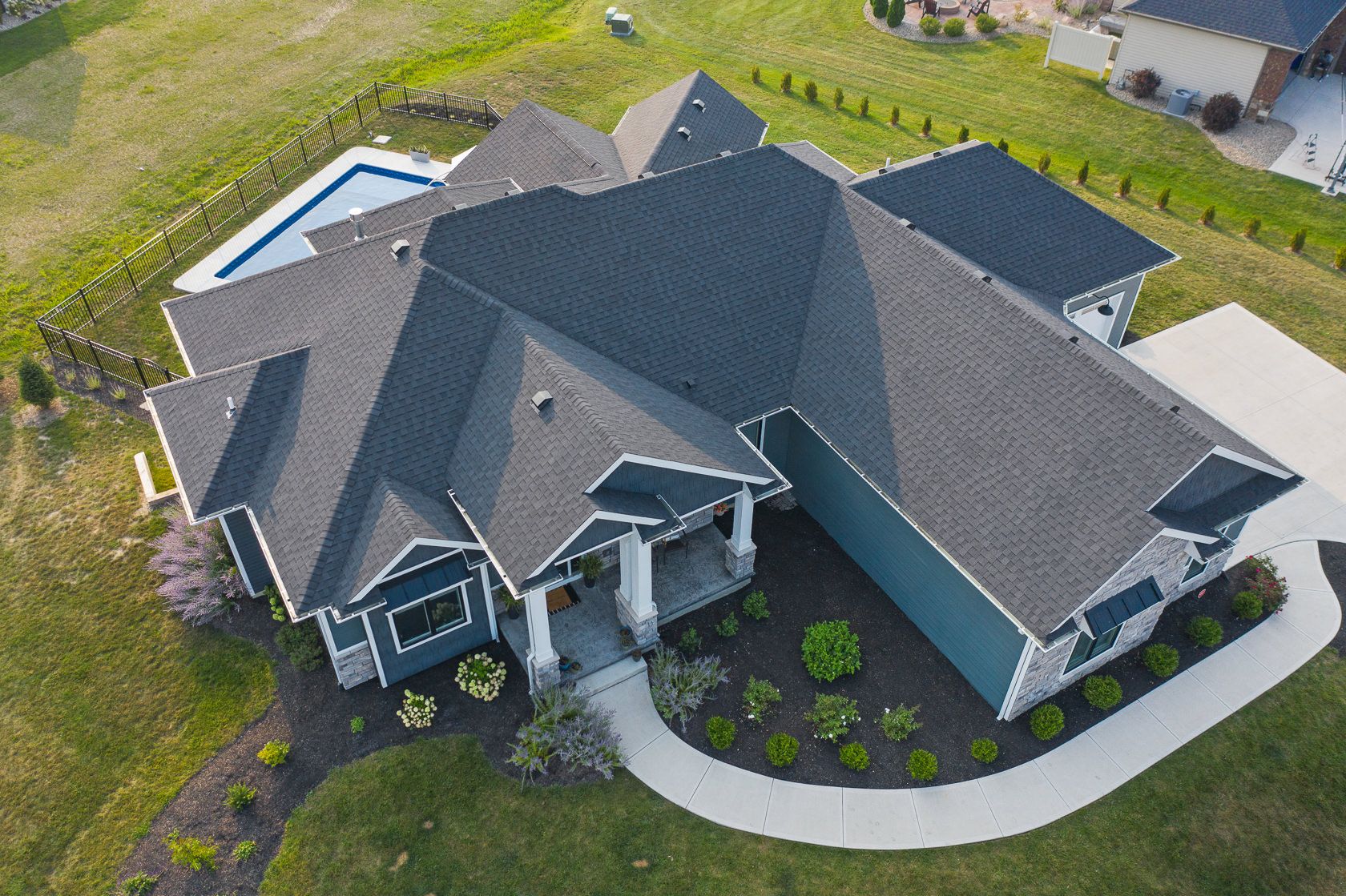 Aerial view of the finished home and lot